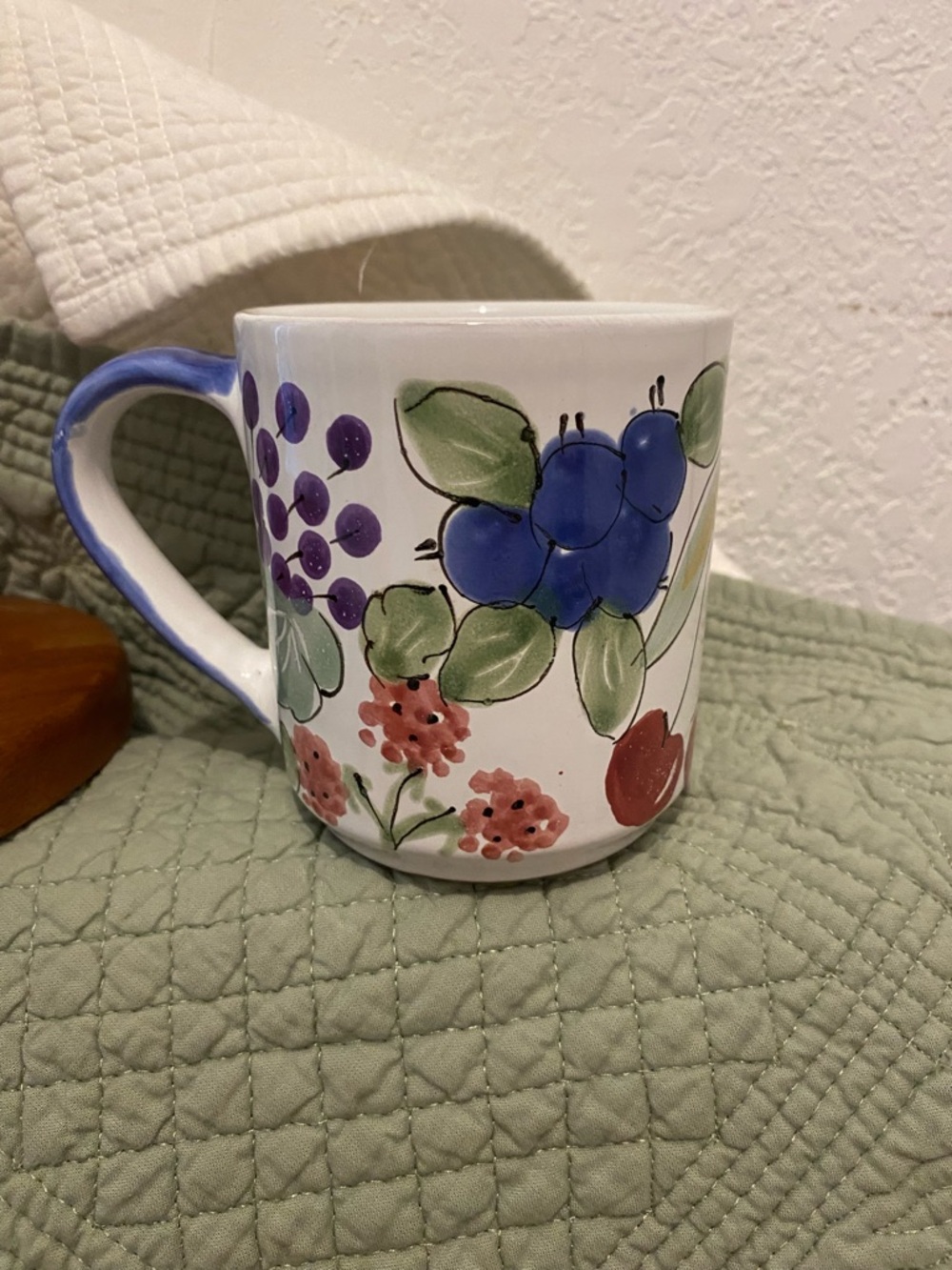 MESA INT’L Hungarian Made Pottery Signed “Fruits Coffee Mug w/Blue Handle” NEW